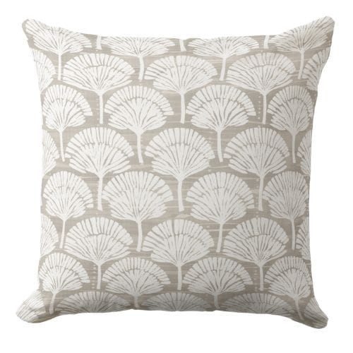 A royal blue throw pillow in a coastal style.