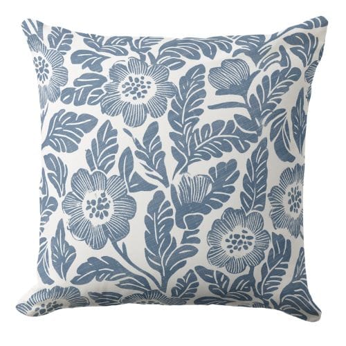 Hamptons coastal pillow features a hand block style print in blue ink on a white background.
