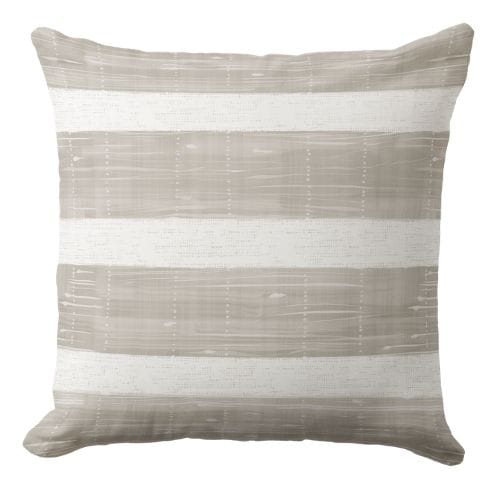 a decorative blue throw pillow featuring a Hamptons style ornate pattern in indigo blue and white.