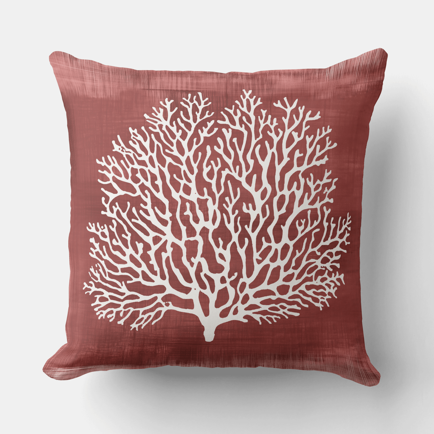 A palm tree throw pillow in dark blue and white in coastal stylecolor