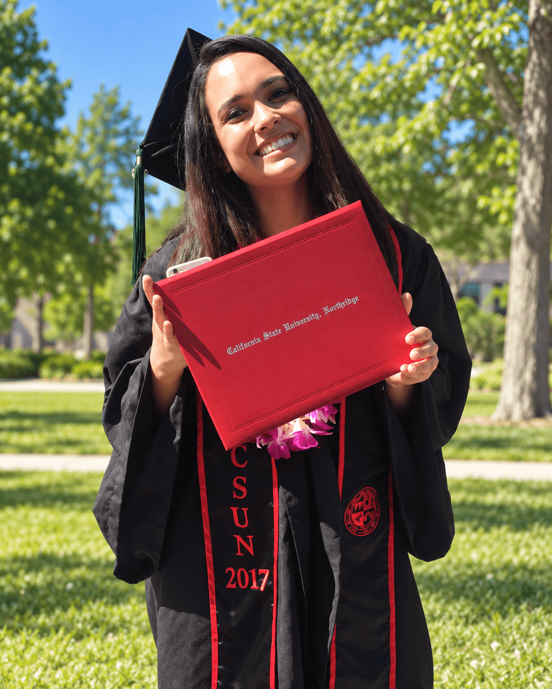 Ixchel celebrating her Bachelor of Science in Kinesiology