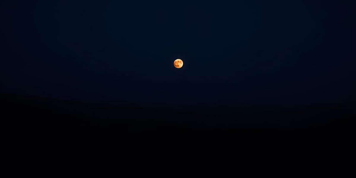 digital guide cover night shift orange moon dark sky minimalist