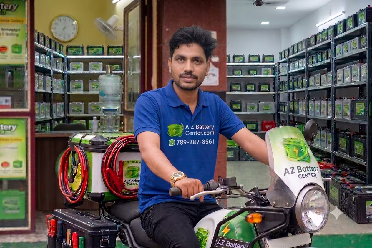 A Z Battery Center mechanic on branded scooter ready for roadside assistance