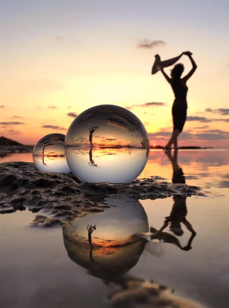 Sunset reflected in glass spheres