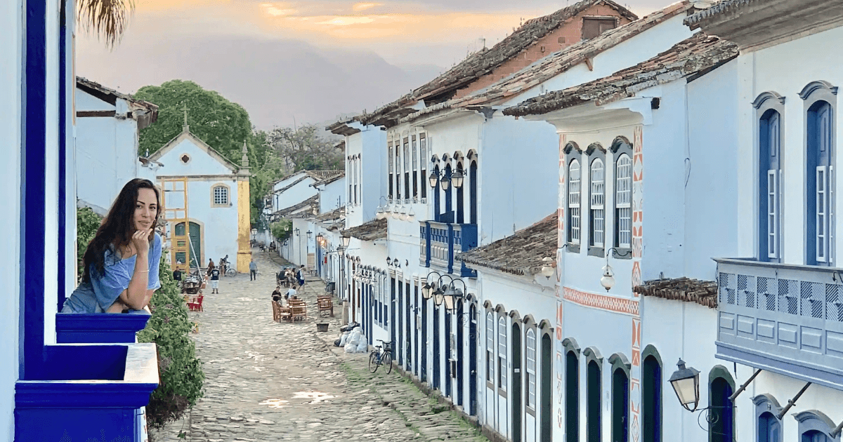 Michele on a balcony of a century old house in Paraty a UNESCO site in Rio de Janeiro State