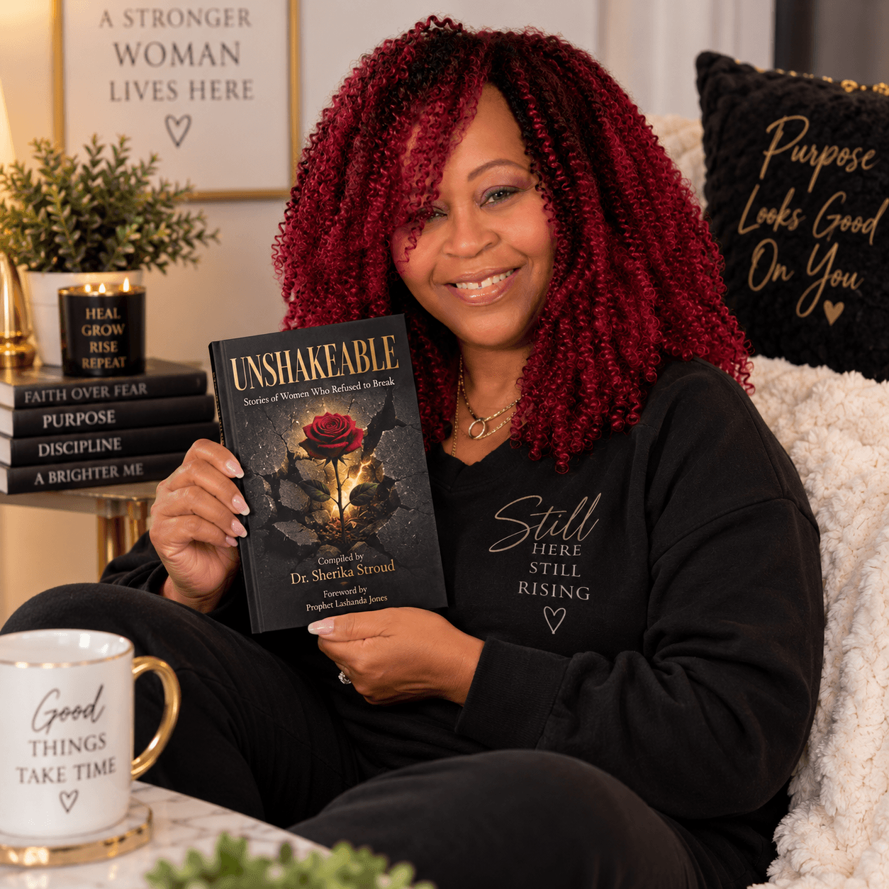 Melissa Caldwell holding the book Unshakable