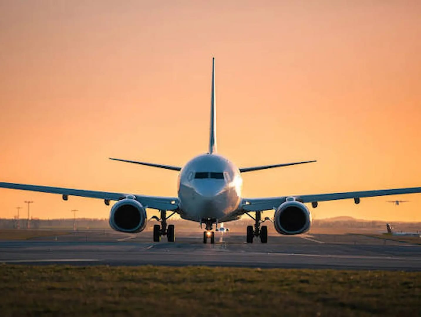 Aircraft approaching an airport runway representing connectivity near Ayodhya