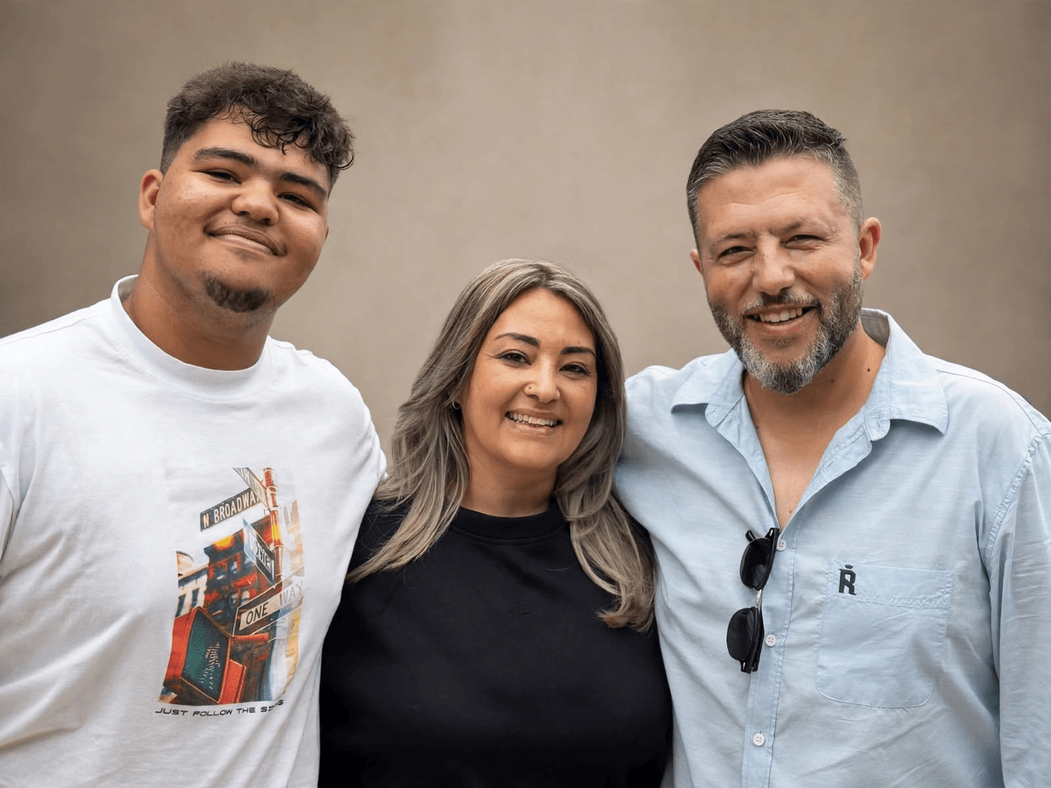 Carline with her husband and son