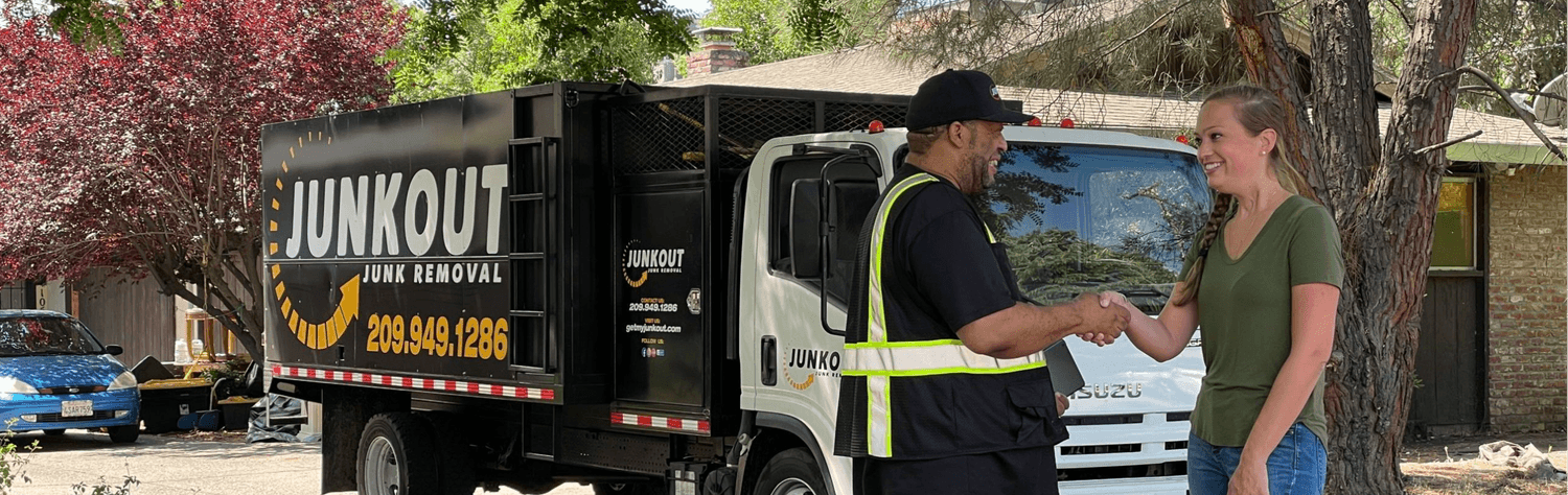 JunkOut customer handshake after junk removal service