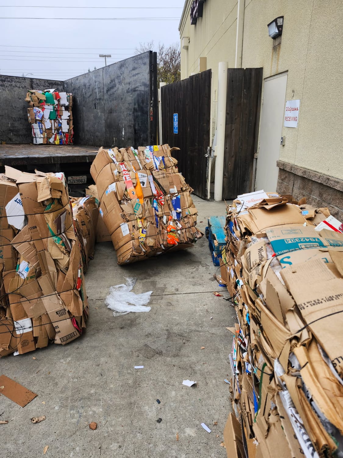 JunkOut large cardboard removal job with truck and packed cardboard