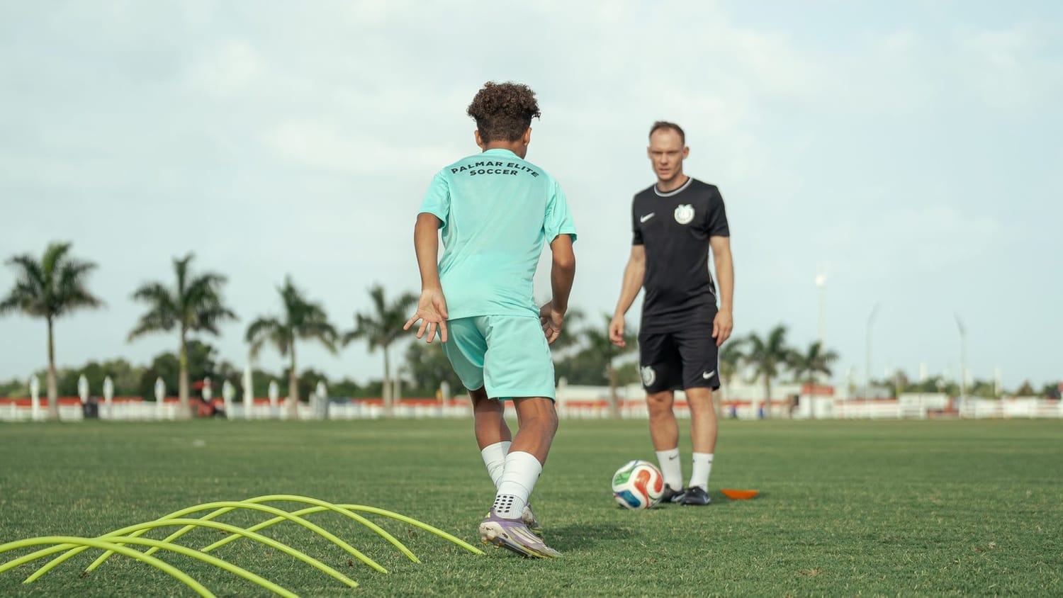 Federico with a boy in training