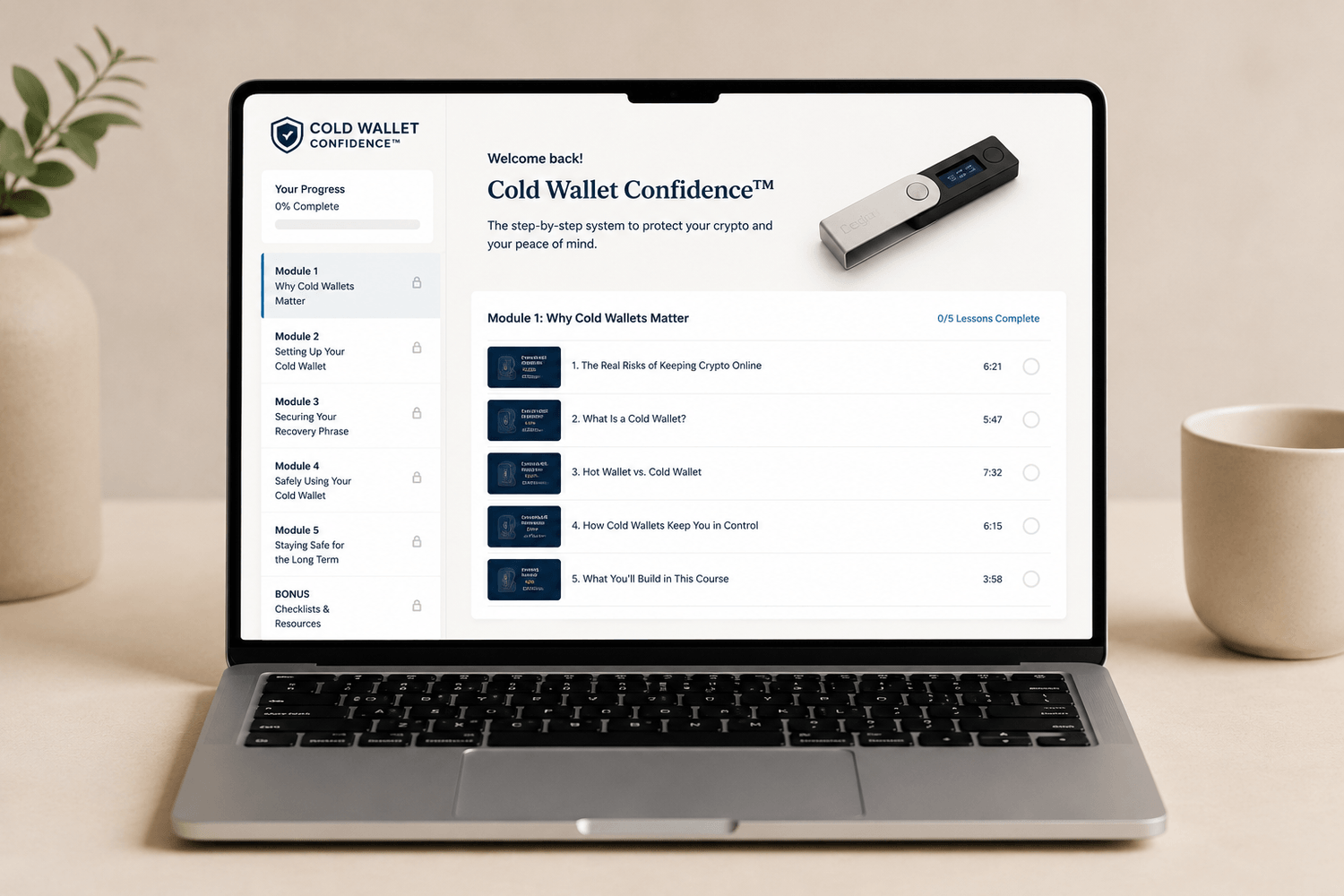 Cold Wallet Confidence video course shown on a laptop