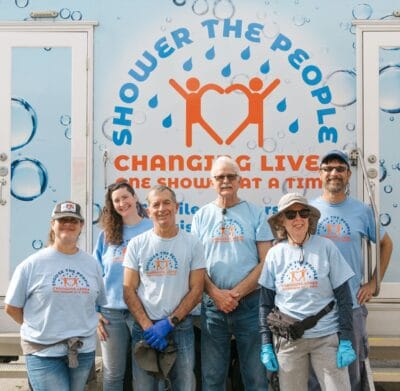 Shower the People volunteer staff