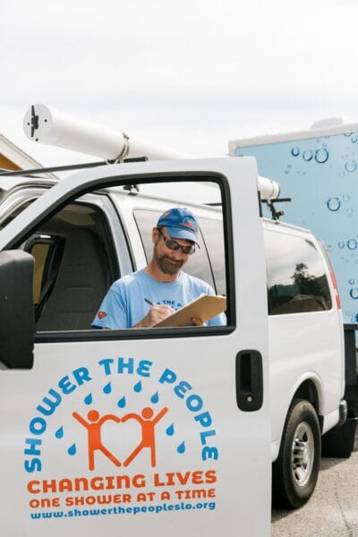 Shower the People volunteer staff