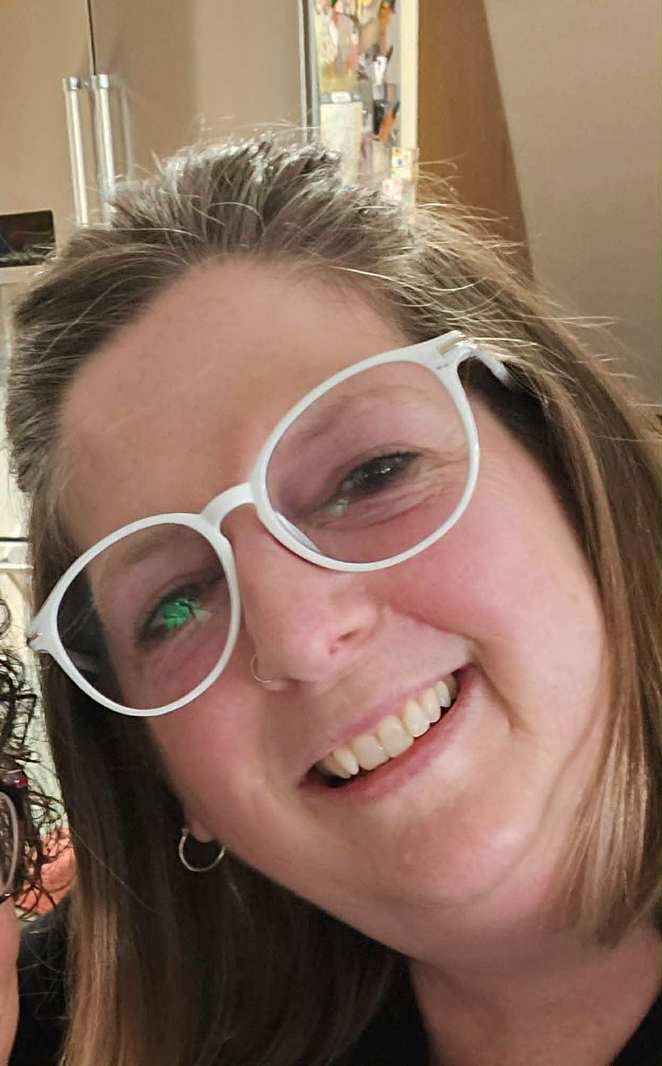 Laurie K.