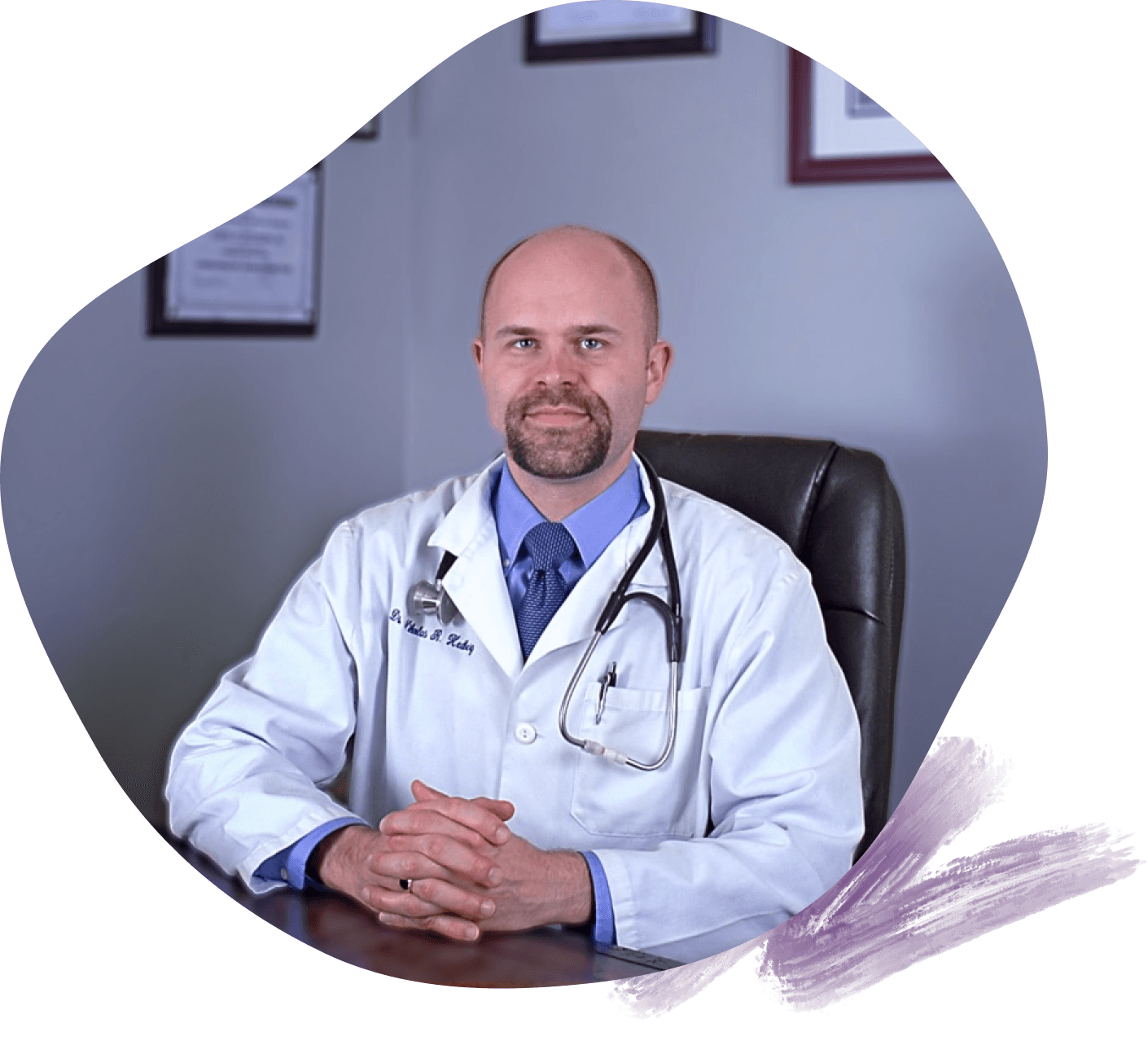 Photo of Dr. Hedberg in his office.