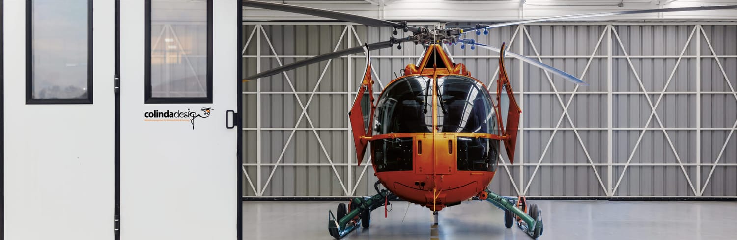 Heli über dem Meer mit dem Spruch: Worauf man seinen Fokus richtet, das wird wahr.