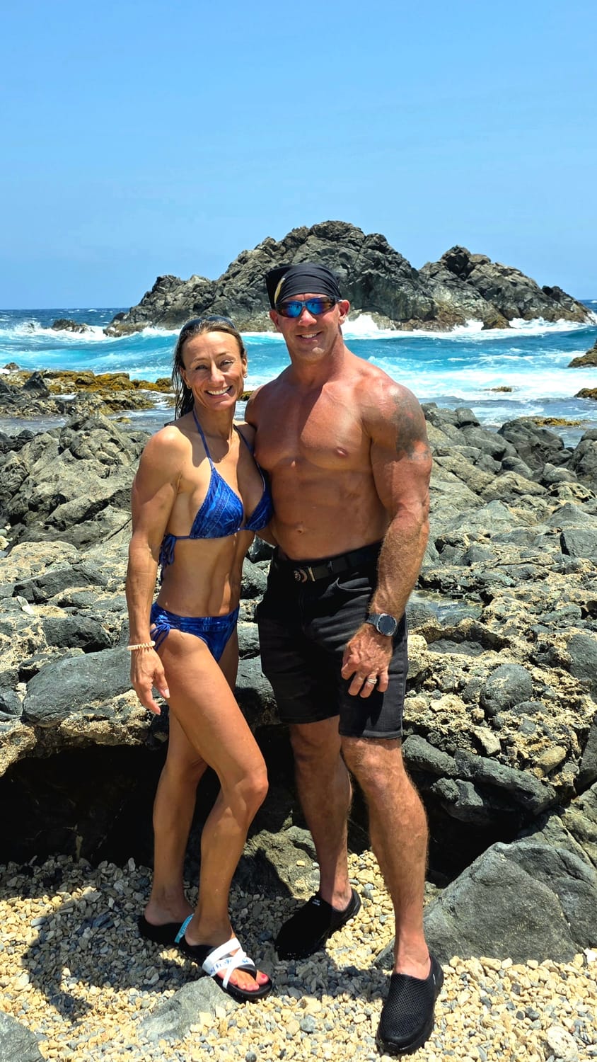 Josh and Sandy on the rocks at the Aruba water hole