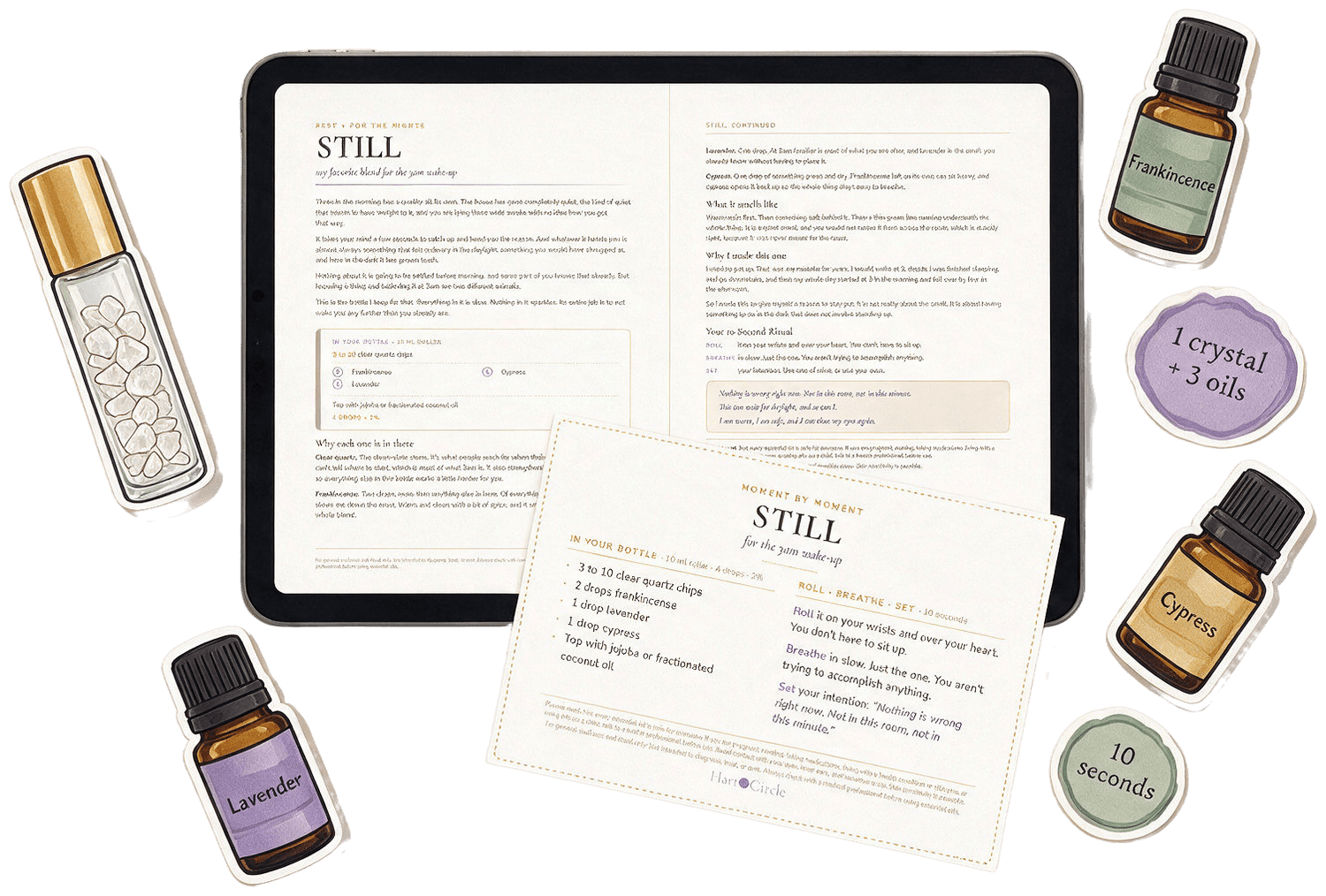 The STILL recipe pages on a tablet, the printable recipe card, a roller bottle and three essential oil bottles