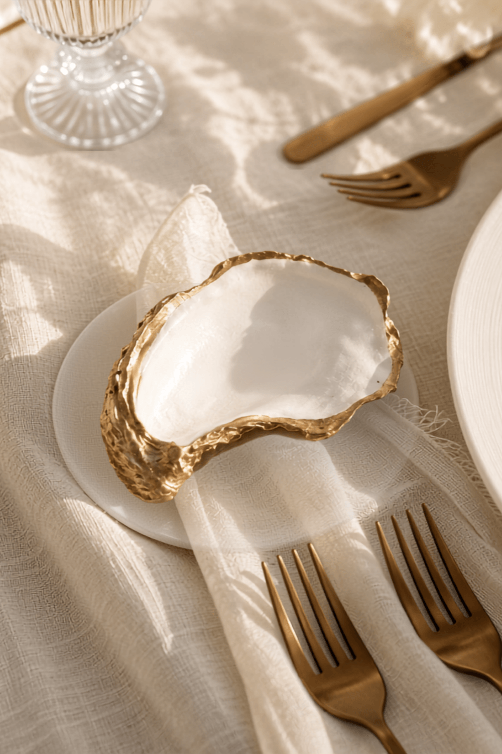 Table setting photographed from above with rings and linen