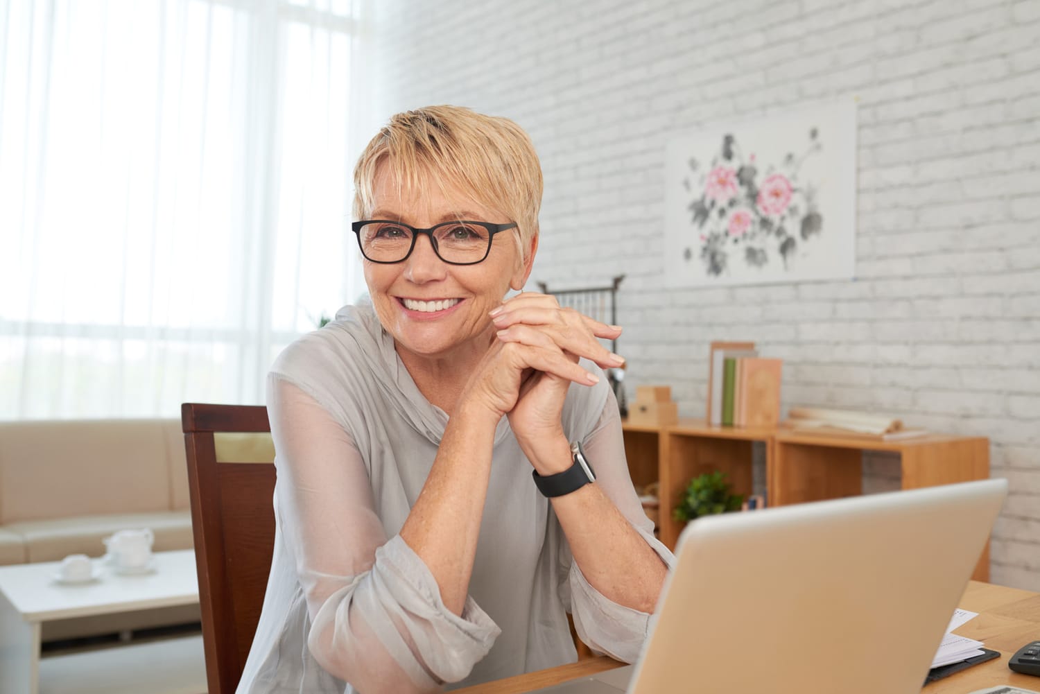 Woman feeling confident at her laptop