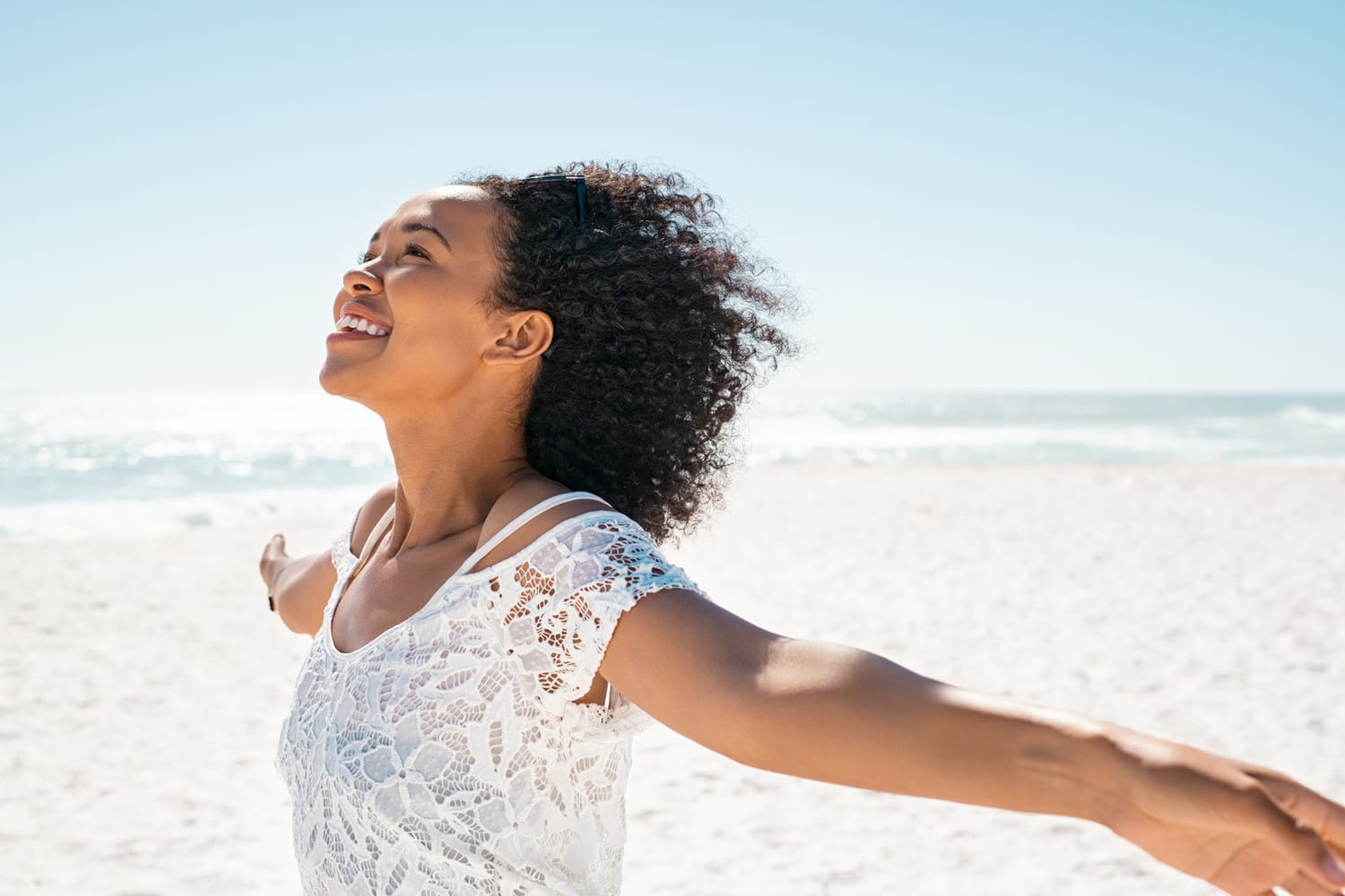 Woman enjoying a peaceful moment at the beach
