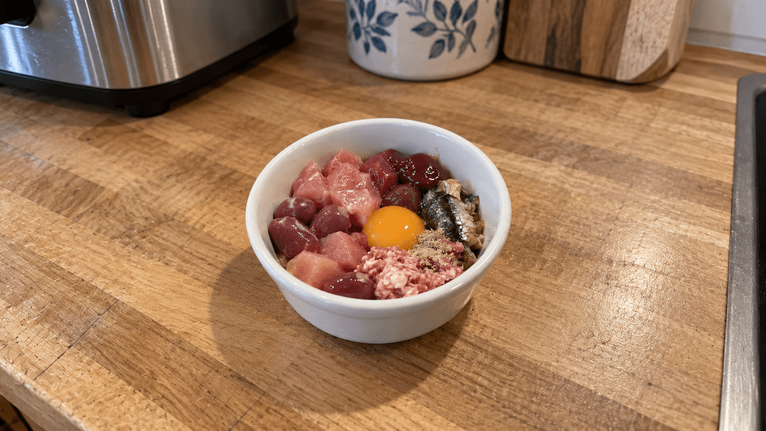 A balanced raw bowl for an adult cat
