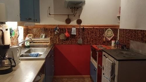 Kitchen with wood-burning stove