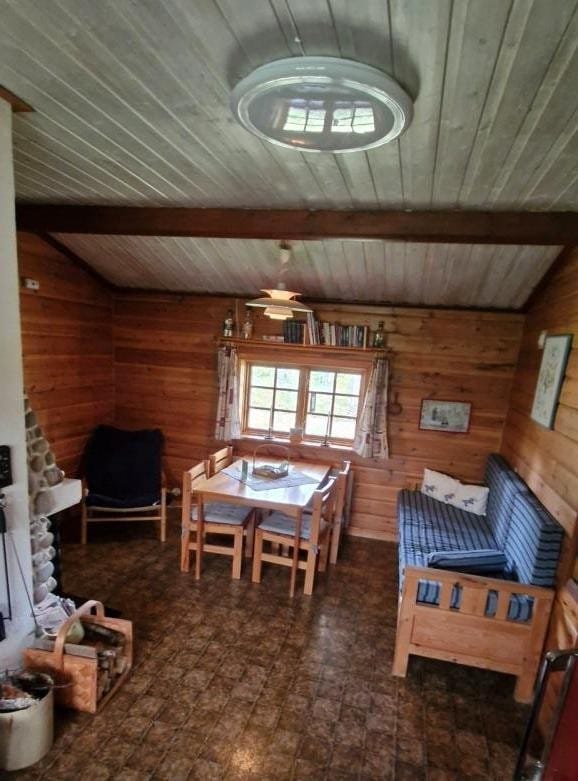 Dining area with wooden panelling