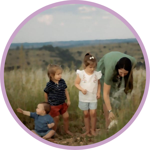 Jess with her three children in the garden