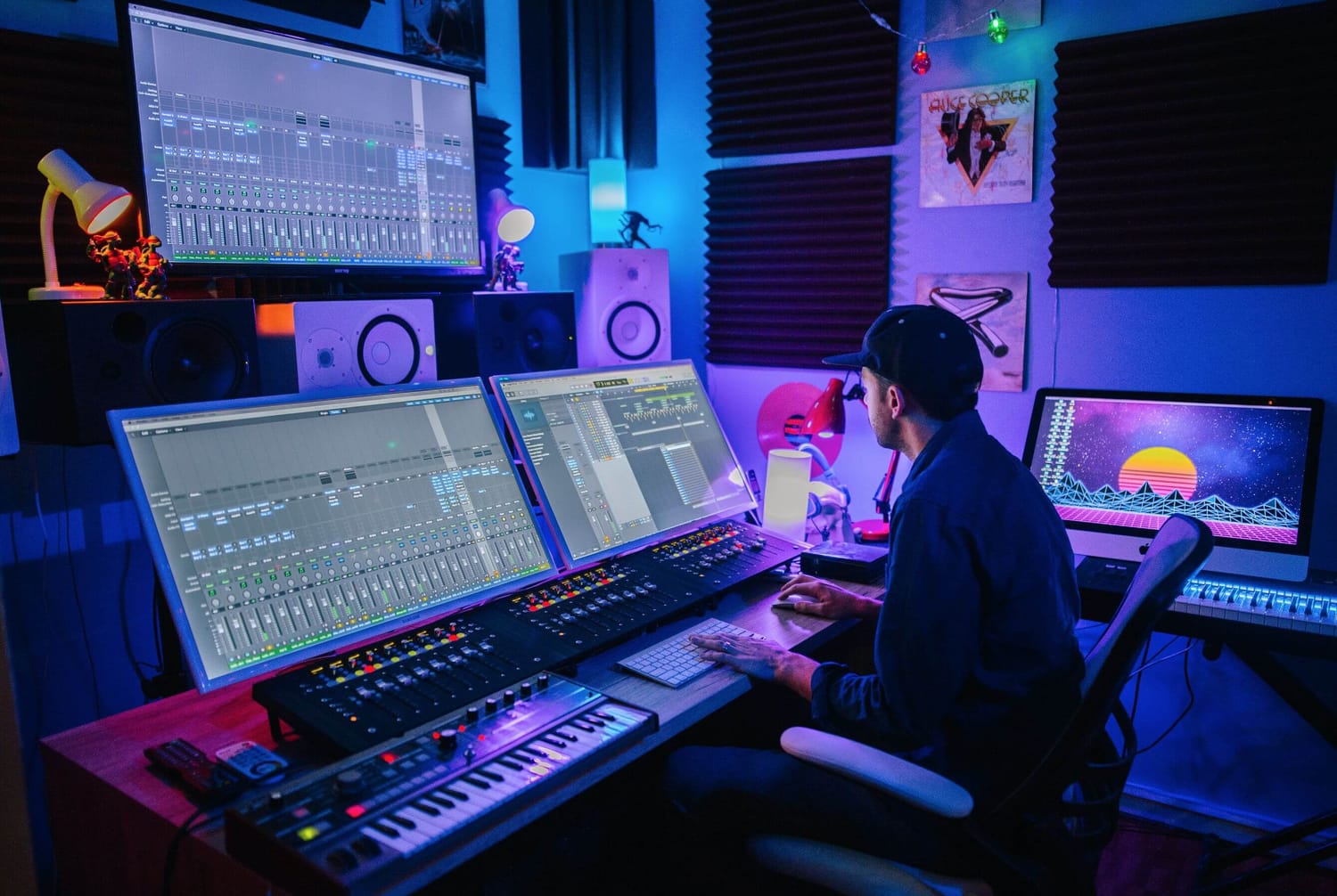 DAW track timeline and mixing desk used for song mixing and audio mastering at XMPLA Studios