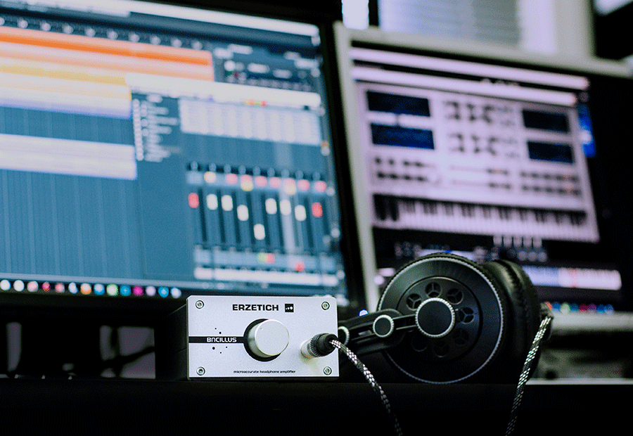 DAW track timeline and mixing desk used for song mixing and audio mastering at XMPLA Studios