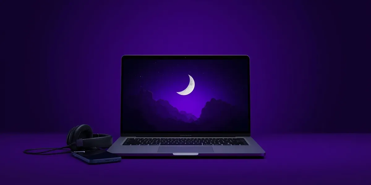online course on laptop and phone, headphones, crescent moon, violet night