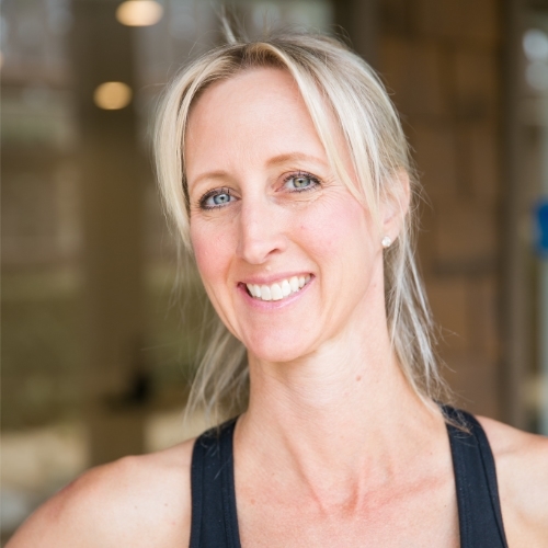 women with blonde hair smiling