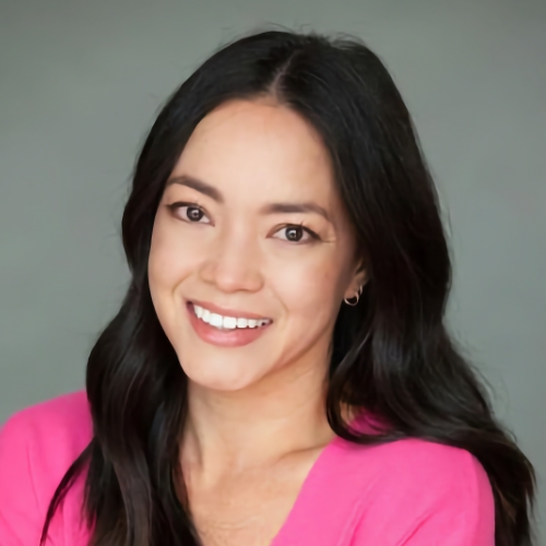 women wearing pink shirt smiling