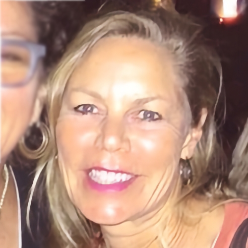 women with blonde hair smiling