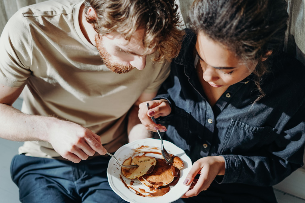 Couple eating pancakes
