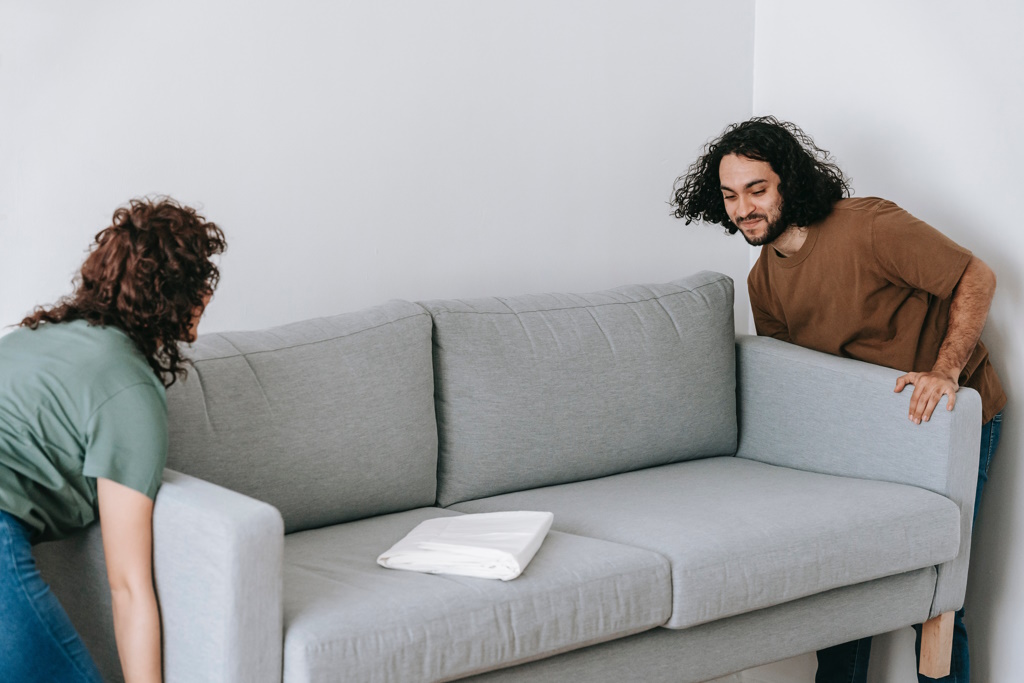 Couple Moving Couch