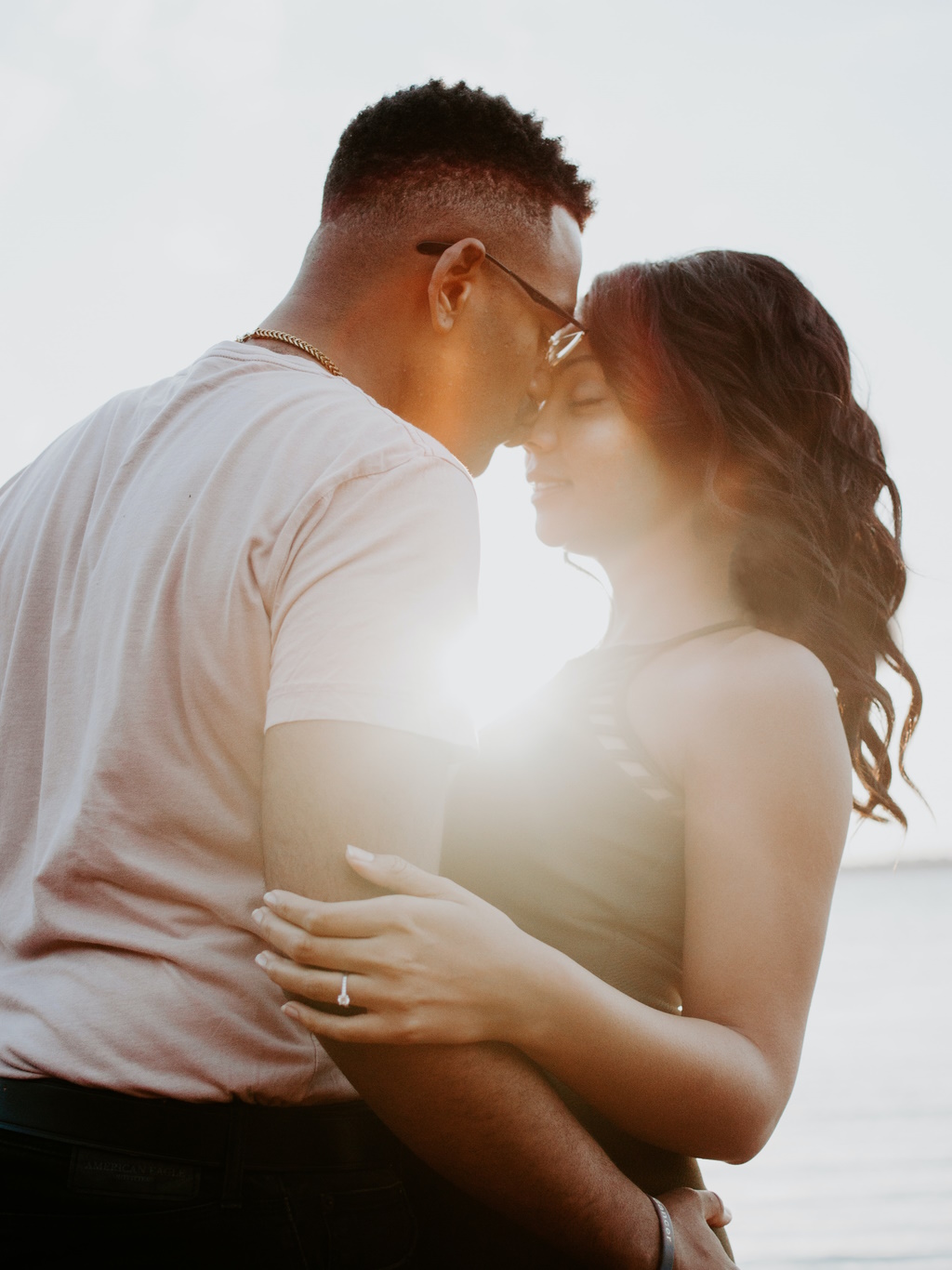 Man Kissing Woman