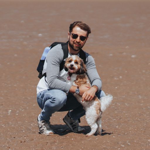 Man with his dog showing his active life because of Perfect Pack