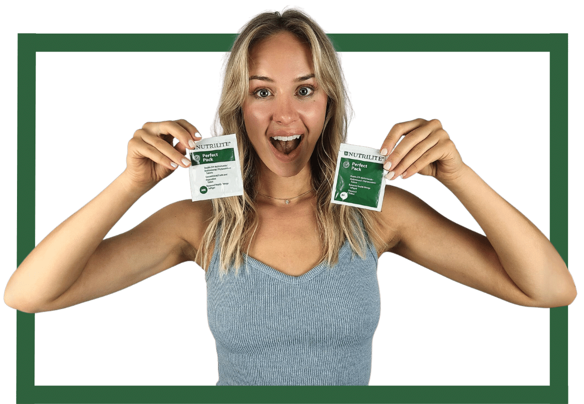 Image of an excited women holding two sachets of Perfect Pack showing both the AM and the PM packets.