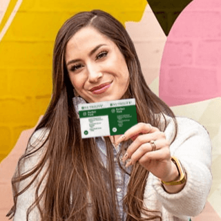 Women holding Perfect Pack happy and content