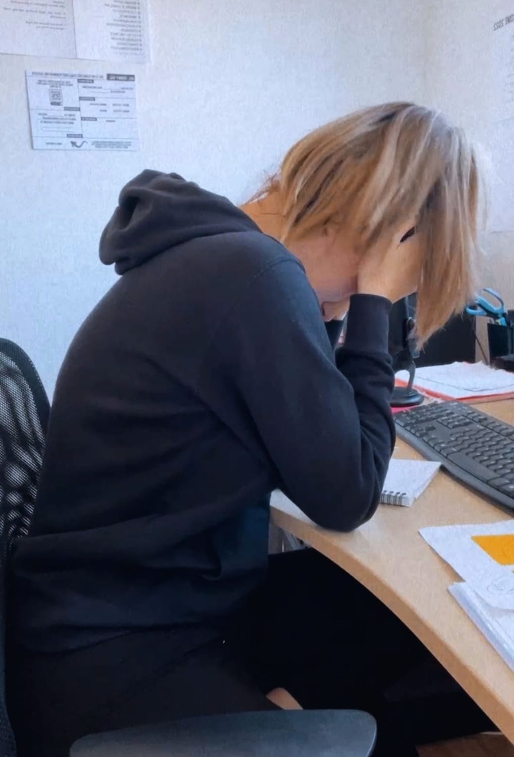 Anne at desk
