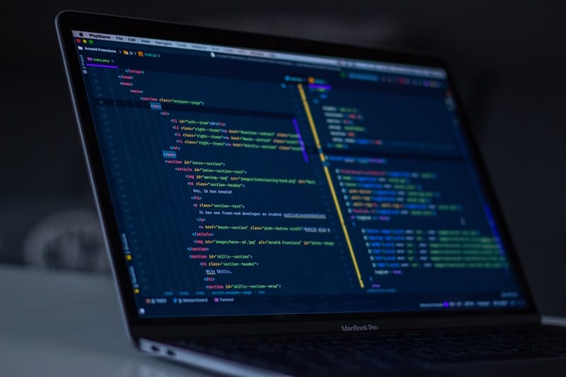 A child learning to code on a bright screen