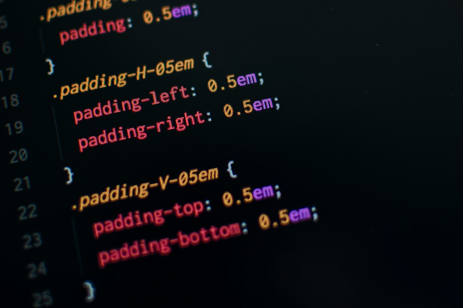 Developer desk with code and design documentation