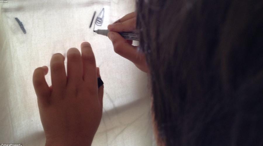 A happy child holding a savings passbook - what are banks for kids conclusion