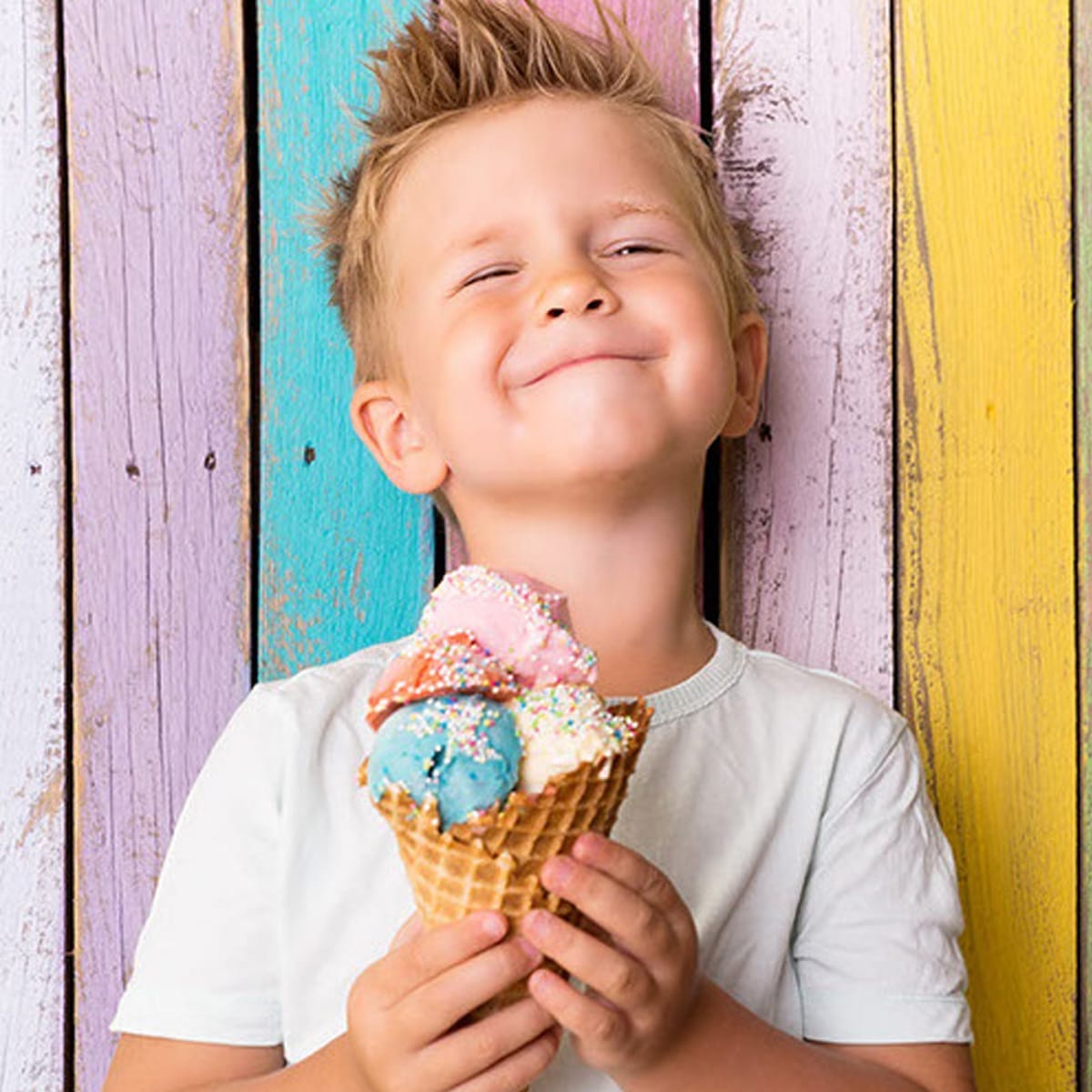 Happy child holding ice cream – Saffron Ice Cream branding