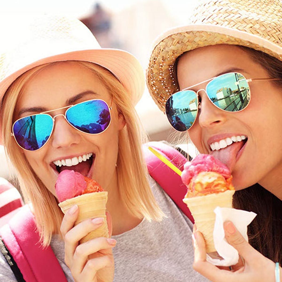 Lifestyle shot of friends smiling while eating ice cream – Saffron Ice Cream branding