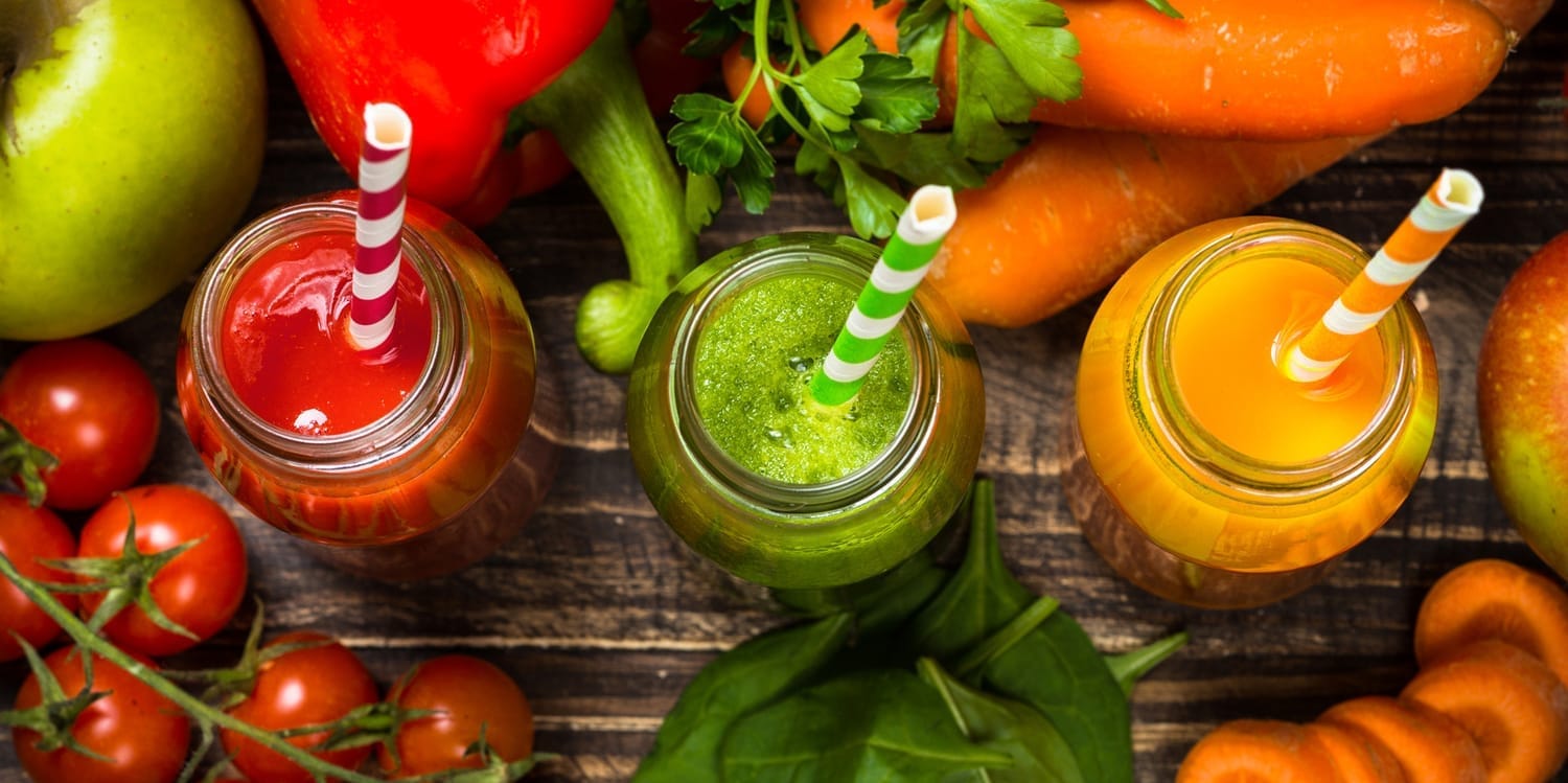 Overhead shot of Froots Raw Juice – red, green, orange traffic light health range