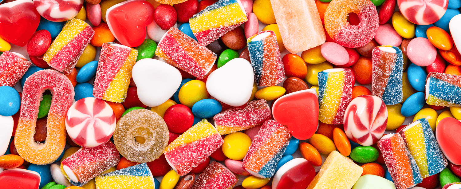 Colourful array of Sugarsin premium gummies, candy and chocolates